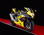 MOT 02 RK0227 02
2005 Suzuki GSXR 1000 Black And Yellow 3/4 Front View On Red Floor Gray Line Studio