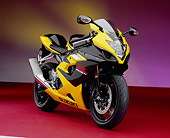 MOT 02 RK0232 01
2005 Suzuki GSXR 1000 Black And Yellow 3/4 Front View On Red Floor Yellow Purple Lighting Studio