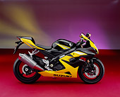 MOT 02 RK0235 06
2005 Suzuki GSXR 1000 Yellow And Black Profile View On Red Floor Yellow Purple Lighting Studio