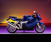 MOT 02 RK0264 10
2005 BMW K1200 Blue Profile View On Purple Floor Colorful Background Studio
