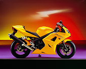 MOT 02 RK0270 02
2005 Triumph Daytona 650 Yellow Profile View On Purple Floor Lightning Background Studio