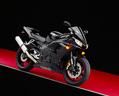 MOT 02 RK0272 03
2005 Yamaha YZF-R6 Black Side 3/4 View On Red Floor Studio