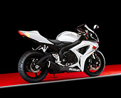 MOT 02 RK0300 04
2006 Suzuki GSXR 600 Silver And White 3/4 Rear View On Red Floor Studio