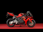 MOT 02 RK0309 01
2006 Honda CBR 1000RR Red Profile View On Red Floor Studio