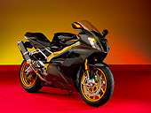 MOT 02 RK0325 01
2006 Aprilia Factory RSV 1000RR Black 3/4 Front View On Red Floor Studio