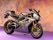 MOT 02 RK0352 01
2006 Triumph Daytona 675 Graphite 3/4 Side View On Purple Floor Studio