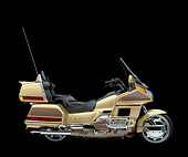 MOT 03 RK0001 02
1991 Honda GoldWing Anniversary Ed. Gold profile in studio on black
