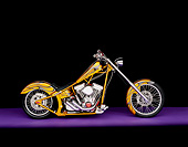 MOT 04 RK0013 06
2004 Coastside Custom Chopper Gold With Flames Side View On Purple Floor Studio