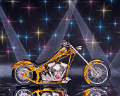 MOT 04 RK0016 04
2004 Coastside Custom Chopper Gold With Flames Profile View Studio