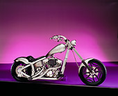 MOT 04 RK0100 01
2003 Swift Bar Chopper Silver Side View Purple Floor And Lighting Studio