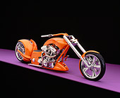 MOT 04 RK0148 07
2006 Brouhard Custom Softail Pearl Orange 3/4 Front View On Purple Floor Studio
