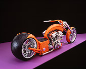 MOT 04 RK0151 07
2006 Brouhard Custom Softail Pearl Orange 3/4 Rear View On Purple Floor Studio