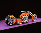 MOT 04 RK0152 05
2006 Brouhard Custom Softail Pearl Orange 3/4 Rear View On Purple Floor Studio