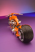 MOT 04 RK0181 01
2006 Brouhard Custom Softail Pearl Orange Overhead 3/4 Rear View On Purple Floor