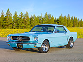 MST 01 BK0013 01
1965 Ford Mustang Coupe Blue 3/4 Front View On Pavement By Pine Trees