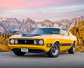 MST 01 BK0016 01
1973 Ford Mustang Mach 1 Grabber Yellow 3/4 Front View On Pavement By Snowy Mountain Peaks