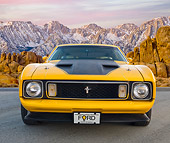 MST 01 BK0019 01
1973 Ford Mustang Mach 1 Grabber Yellow Front View On Pavement By Snowy Mountain Peaks