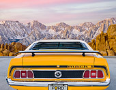 MST 01 BK0020 01
1973 Ford Mustang Mach 1 Grabber Yellow Rear View On Pavement By Snowy Mountain Peaks