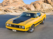 MST 01 BK0021 01
1973 Ford Mustang Mach 1 Grabber Yellow 3/4 Front View On Pavement By Boulders