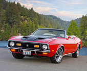 MST 01 BK0036 01
1971 Ford Mustang Convertible Red And Black 3/4 Front View On Pavement By Lake And Pine Trees