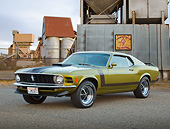 MST 01 BK0085 01
1970 Ford Mustang Boss 302 Lime Green Metallic 3/4 Front View On Pavement By Old Factory