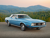 MST 01 BK0100 01
1973 Ford Mustang Convertible Blue 3/4 Front View On Pavement Overlooking Hills At Dusk