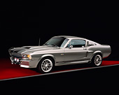 MST 01 RK0628 03
1967 Ford Mustang GT500M Fastback Gray With Black Stripes 3/4 Side View On Red Floor Gray Line Studio