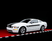MST 01 RK0866 02
2005 Ford Mustang GT White Black Stripes 3/4 Side View On Red Floor Checkered Line Studio