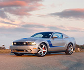 MST 01 RK1121 01
2010 Ford Roush Mustang 427R Silver 3/4 Front View On Pavement