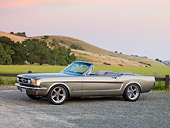 MST 01 RK1140 01
1964 1/2 Ford Mustang Convertible Pewter 3/4 Front View On Gravel By Hills