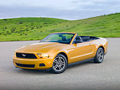 MST 01 RK1235 01
2010 Ford Mustang Gold 3/4 Front View On Pavement By Grassy Hills