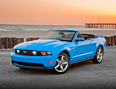 MST 01 RK1241 01
2011 Ford Mustang GT Convertible Blue 3/4 Front View On Pavement By Beach At Sunset