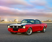 MST 01 RK1310 01
1965 Ford Mustang Restored Model Red, White And Black 3/4 Front View On Pavement At Dusk
