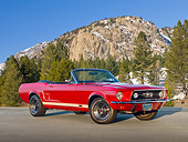 MST 01 RK1383 01
1967 Ford Mustang GTA Convertible Red 3/4 Front View On Pavement By Snowy Mountainside