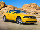 MST 01 RK1412 01
2011 Ford Mustang GT Yellow 3/4 Front View On Sand By Red Rock