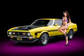 MST 01 RK1467 01
1971 Ford Mustang Boss 351 Yellow 3/4 Front View In Studio With Swimsuit Model