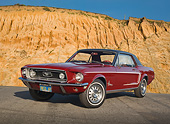 MST 01 RK1496 01
1968 Ford Mustang Royal Maroon 3/4 Front View On Pavement By Rock Wall