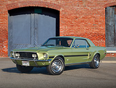 MST 01 RK1514 01
1968 Ford Mustang GT/CS Lime Gold 3/4 Front View On Pavement By Brick Building