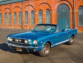 MST 01 RK1526 01
1966 Ford Mustang K-GT Convertible Blue 3/4 Front View On Pavement By Brick Building