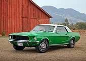 MST 01 RK1629 01
1968 Ford Mustang GT CS Green With White Top 3/4 Front View On Dirt By Red Barn