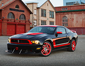 MST 01 RK1637 01
2012 Ford Mustang Boss 302 Laguna Seca Edition Black And Red 3/4 Front View On Pavement By Brick Buildings