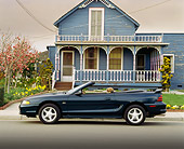 MST 01 RK0033 09
1994 Ford Mustang GT Convertible Green Profile View On Road