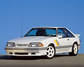 MST 01 RK0073 07
1989 Ford Saleen Mustang SSC White With Graphics 3/4 Front View On Pavement Blue Sky