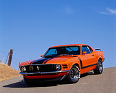 MST 01 RK0074 05
1970 Ford Mustang Boss 302 Black And Orange 3/4 Front On Road
