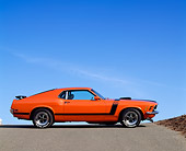 MST 01 RK0075 04
1970 Ford Mustang Boss 302 Orange And Black Profile View On Road