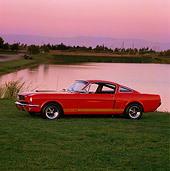 MST 01 RK0090 03
1966 Ford Mustang GT350 Hertz Fastback Red 3/4 Side View On Grass By Water