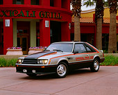 MST 01 RK0198 01
1979 Ford Mustang Pace Car Front 3/4 View On Cement In Front Of Restaurant Headlights On
