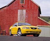 MST 01 RK0296 04
1999 Ford Mustang GT Yellow Low 3/4 Front View On Pavement