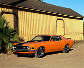 MST 01 RK0306 01
1970 Ford Mustang Mach 1 Grabber Orange 3/4 Front View On Dirt