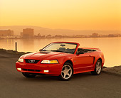 MST 01 RK0328 03
2000 Ford Mustang GT Convertible Red 3/4 Front View On Pavement By Water At Dusk
